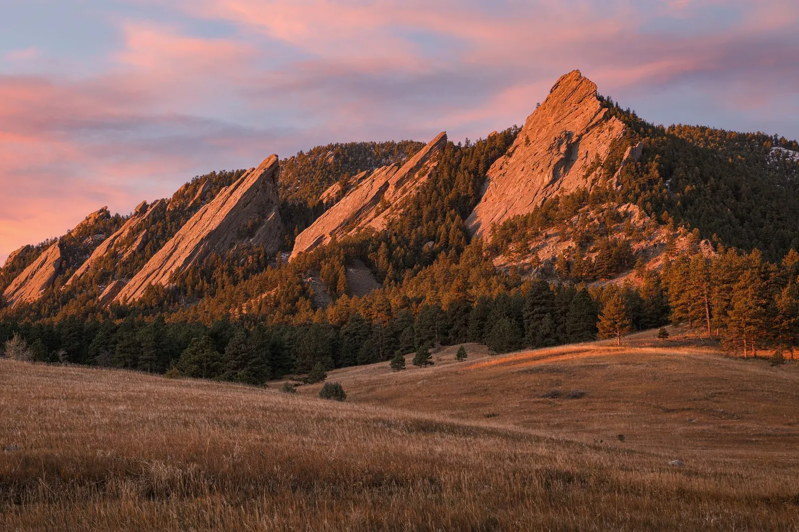The Flatirons above Boulder, Colorado at sunrise, where StayReady runs Airbnb and short term rental turnover cleaning