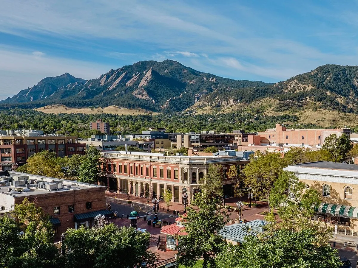 Downtown Boulder and the Pearl Street Mall with the Flatirons behind, in StayReady's Boulder County service area