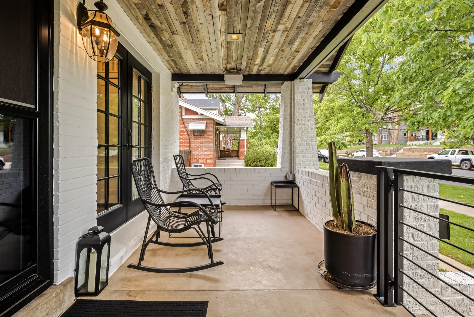 Covered front porch of a Denver bungalow short term rental in the Denver Metro