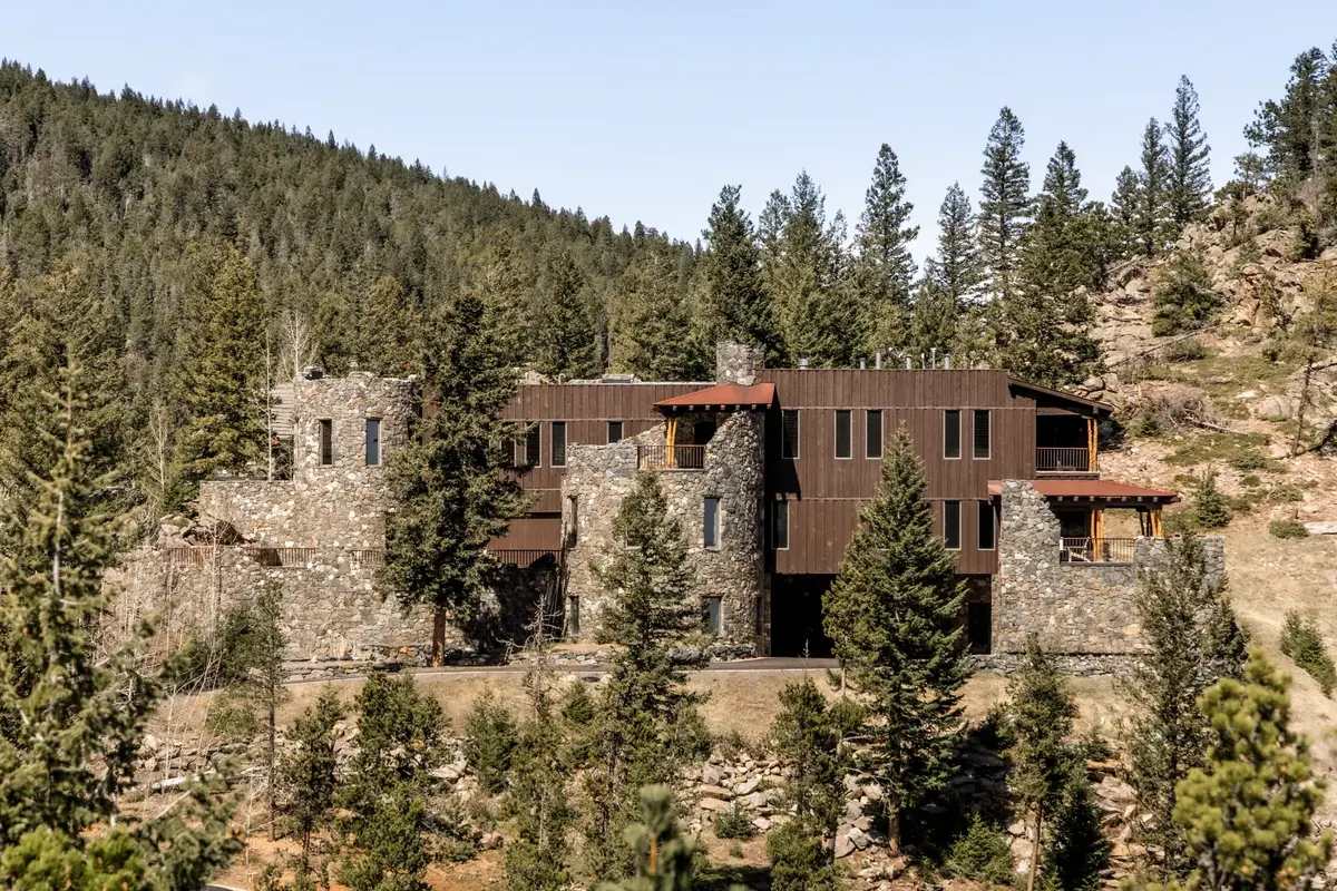 Stone and timber mountain property among Colorado pines