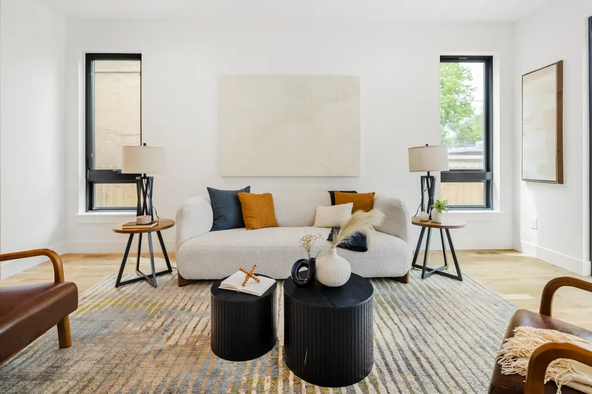 Boucle sofa and neutral living room in a Colorado short term rental