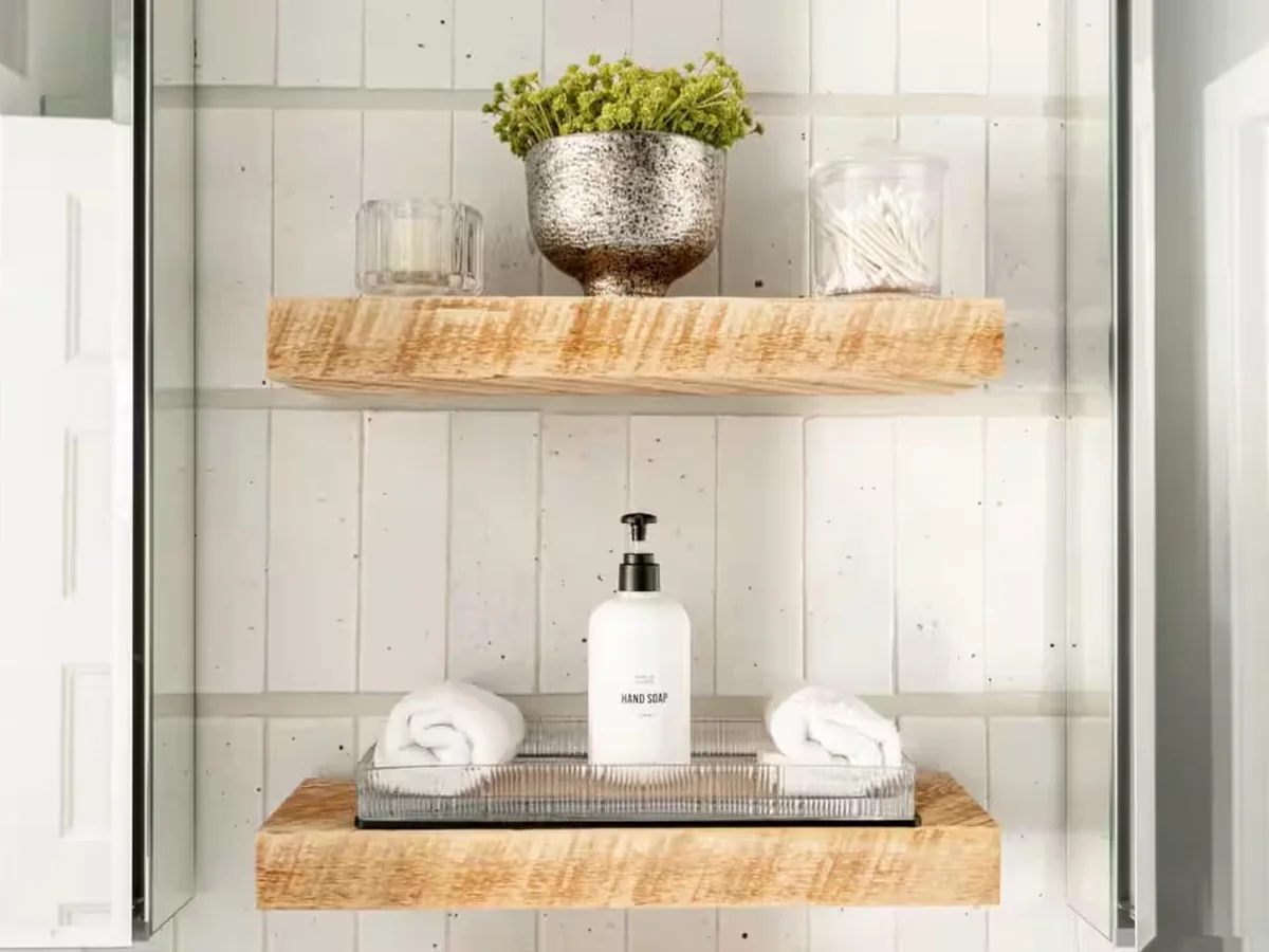 Bath amenities staged on a shelf during a StayReady restocking visit